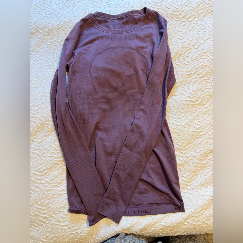 Purple colored lululemon swiftly